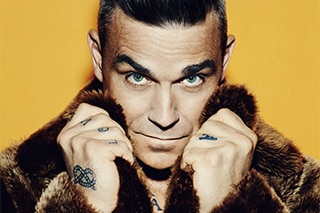 Robbie Williams torna sulle scene con un nuovo album di inediti